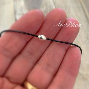 Silver Plated Small Oval Bead Wax Cord Bracelet